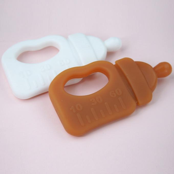 Custom New Design Bottle Teeth Chew Stick Silicone BPA حر Baby Teether toy with box